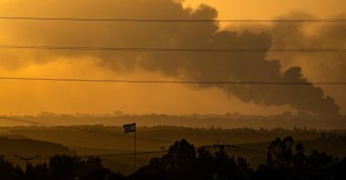 This picture taken from southern Israel, near the border with the Gaza Strip, shows smoke rising from northern Gaza during shelling by Israeli forces, Nov. 7, 2023. (AFP Photo)