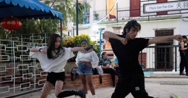 Young Cuban fans of popular Korean K-pop music dance at the San Fan Con square in Havana, Cuba, Oct. 21, 2023. (AFP Photo)