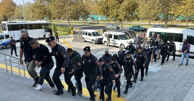Security officers escort suspects captured in an operation against the PKK, in Tekirdağ, northwestern Türkiye, Oct. 25, 2023. (DHA Photo)