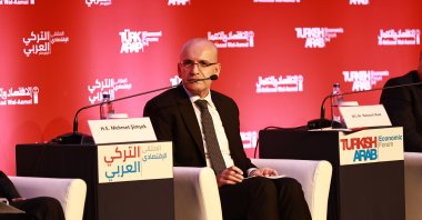 Treasury and Finance Minister Mehmet Şimşek delivers a speech during the 14th Turkish-Arab Economic Forum (TAF'2023), Istanbul, Türkiye, Nov. 8, 2023. (IHA Photo)