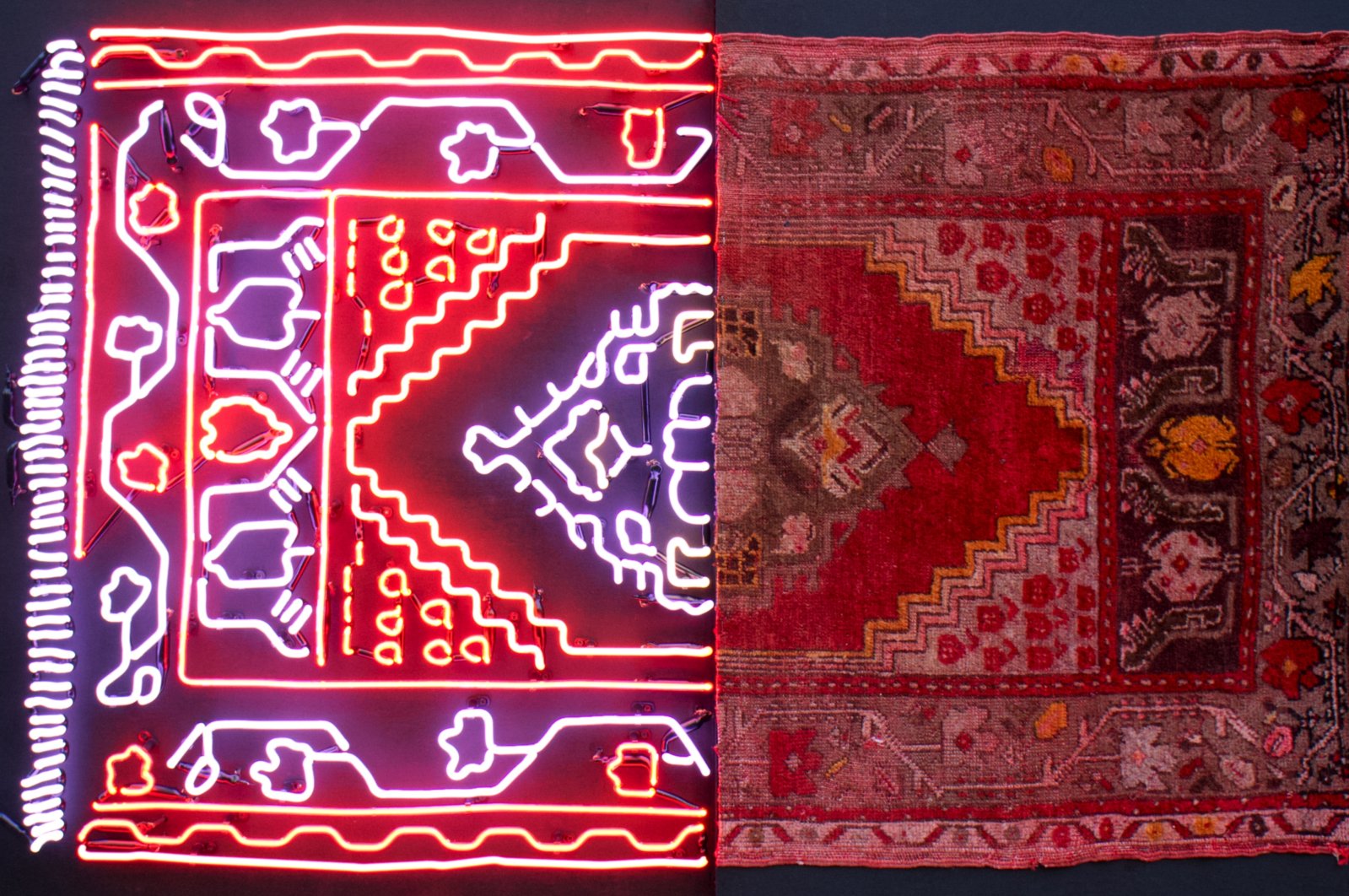 &quot;Feel at Home 10,&quot; by Ramazan Can, carpet, neon, wood, plexiglass, 2022. (Photo courtesy of Anna Laudel)