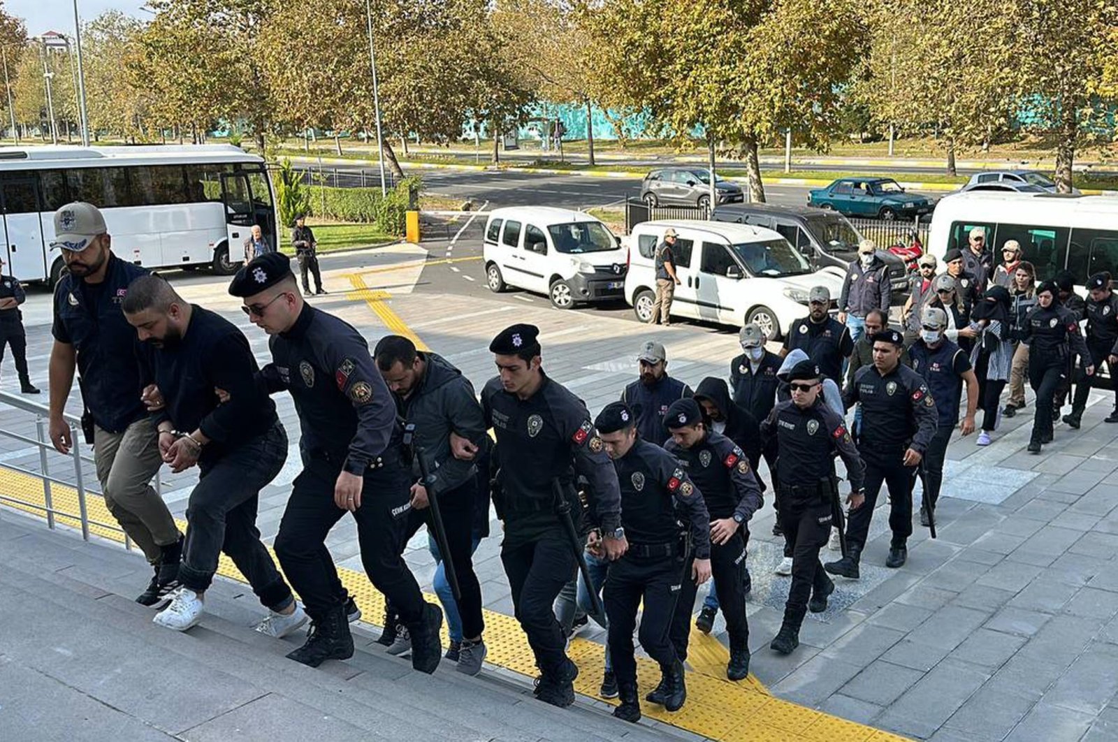 Security officers escort suspects captured in an operation against the PKK, in Tekirdağ, northwestern Türkiye, Oct. 25, 2023. (DHA Photo)