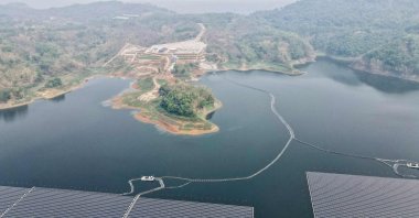 This aerial picture shows the newly built floating solar power plant that can generate 192 megawatts of peak electricity in cooperation between the Indonesian government and Masdar from the UAE, at Cirata Reservoir, West Java, Indonesia, Nov. 9, 2023. (AFP Photo)