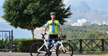 Turkish cyclist Ataman Şekerci poses for a photo, Antalya, Türkiye, Nov. 8, 2023. (AA Photo)