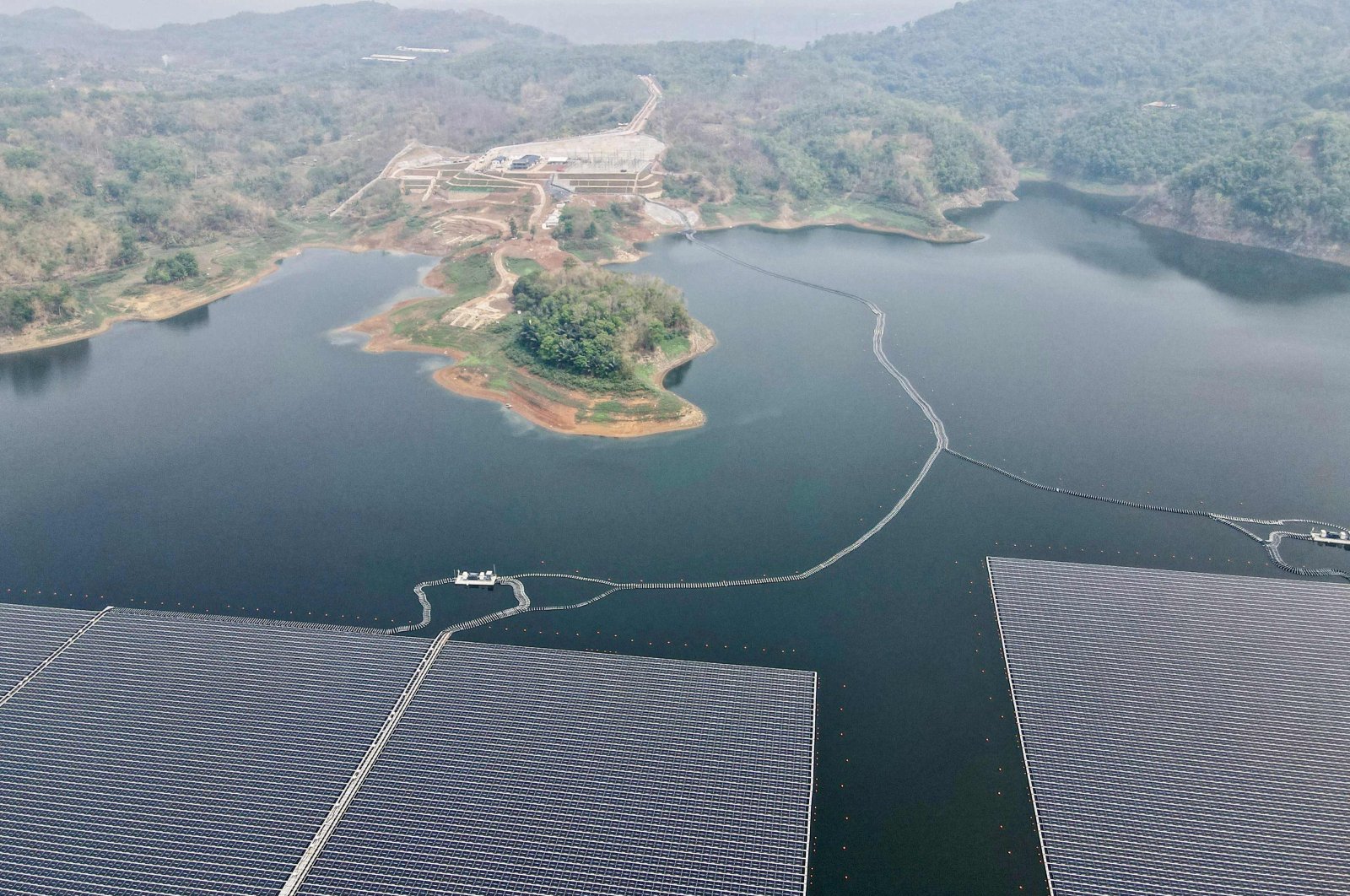 This aerial picture shows the newly built floating solar power plant that can generate 192 megawatts of peak electricity in cooperation between the Indonesian government and Masdar from the UAE, at Cirata Reservoir, West Java, Indonesia, Nov. 9, 2023. (AFP Photo)