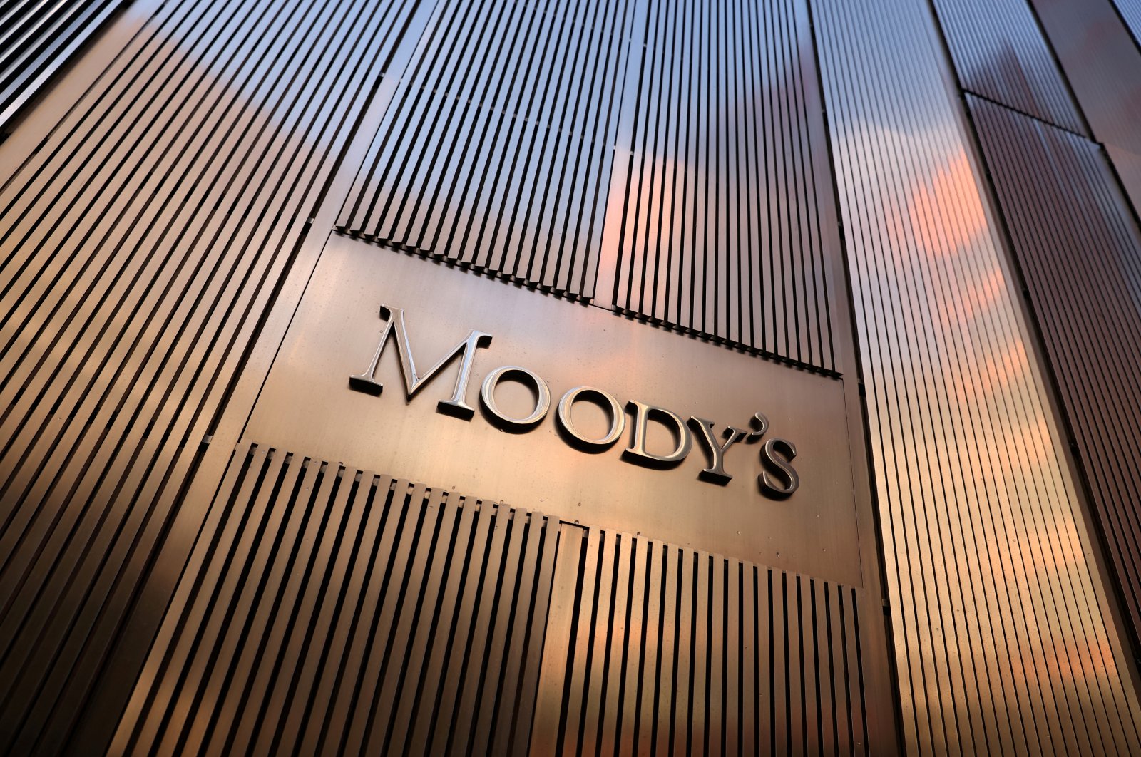 Signage is seen outside the Moody&#039;s Corporation headquarters in Manhattan, New York, U.S., Nov. 12, 2021. (Reuters Photo)