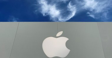 The Apple logo is shown atop an Apple store at a shopping mall in La Jolla, California, U.S., Dec. 17, 2019. (Reuters Photo)