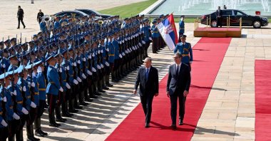 Serbian President Aleksandar Vucic (R) walks past a guard of honor with President Recep Tayyip Erdoğan before their meeting in Belgrade, Serbia, Sept. 7, 2022. (AFP Photo)