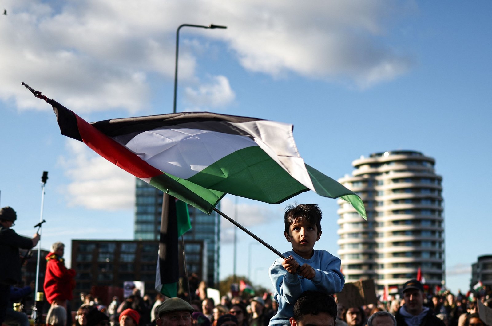 A child waves a Palestinian flag during the &#039;National March For Palestine&#039; in central London, U.K., Nov. 11, 2023. (AFP Photo)