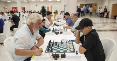 Chess players in action during the seventh edition of the International Chess Tournament, Mersin, Türkiye, Nov. 13, 2023. (IHA Photo)
