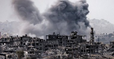 This picture taken from a position along the border with the Gaza Strip in southern Israel shows a smoke plume erupting during Israeli bombardment on the Palestinian enclave amid ongoing battles, Nov. 12, 2023. (AFP Photo)