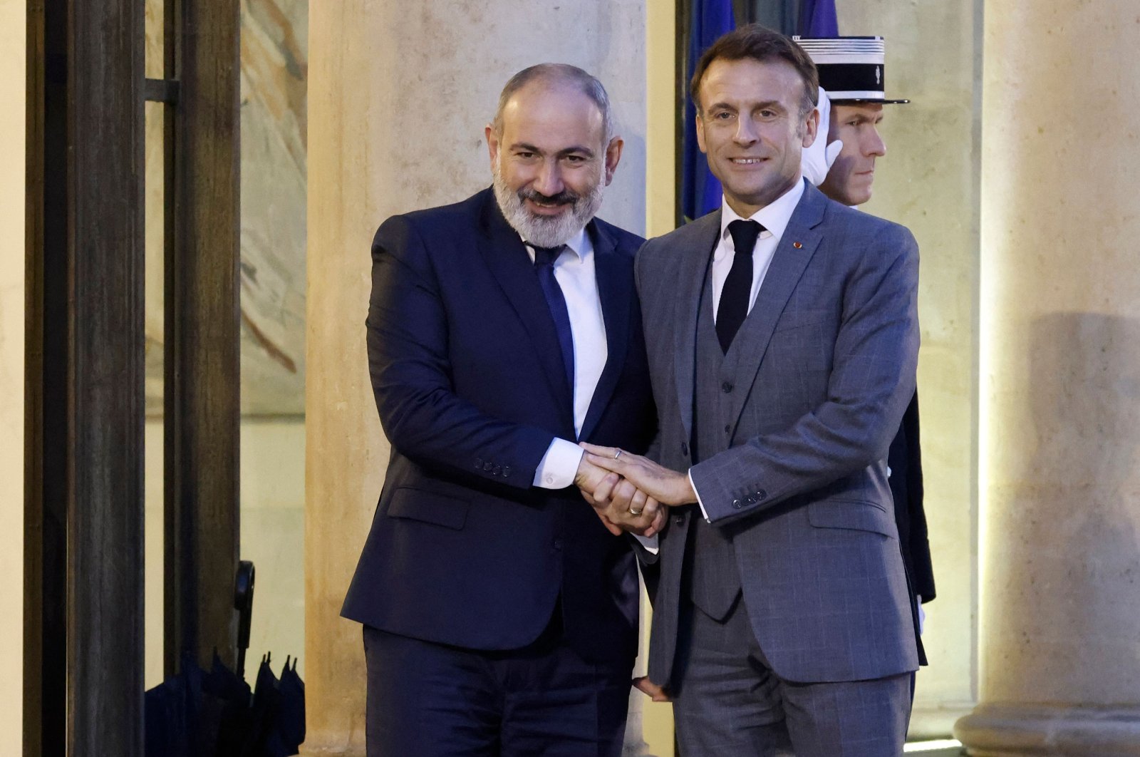 French President Emmanuel Macron greets Armenian Prime Minister Nikol Pashinyan prior to a bilateral meeting at the Elysee Presidential Palace, Paris, France, Nov. 9, 2023. (AFP Photo)