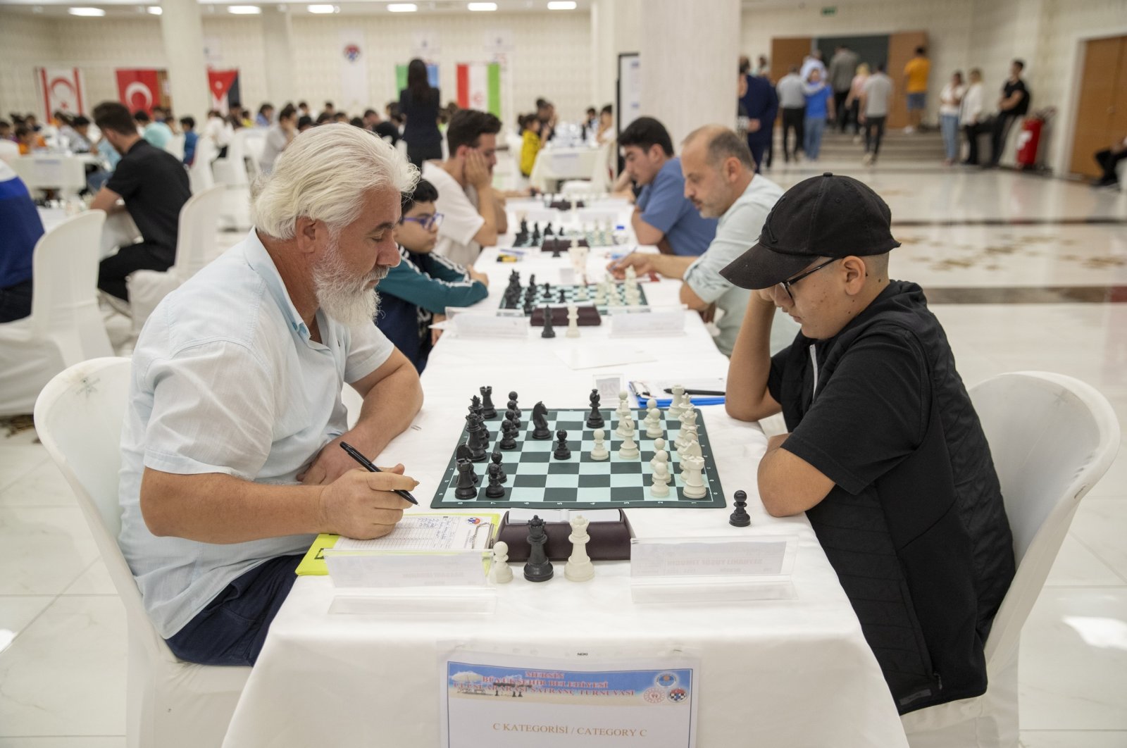 Chess players in action during the seventh edition of the International Chess Tournament, Mersin, Türkiye, Nov. 13, 2023. (IHA Photo)