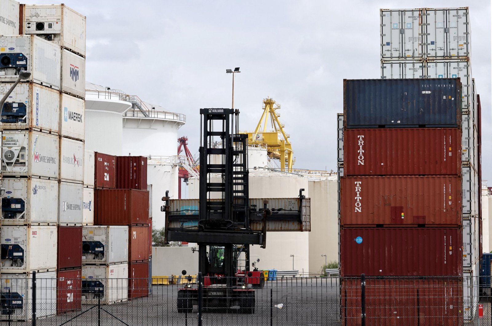 A worker moves containers at the compound of ports operator DP World at Port Botany, Sydney, Australia, Nov. 13, 2023. (AFP Photo)