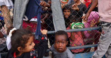 Displaced Palestinian children gather for breakfast at a refugee camp in Rafah, southern Gaza Strip, Palestine, Nov. 12, 2023. (AFP Photo)