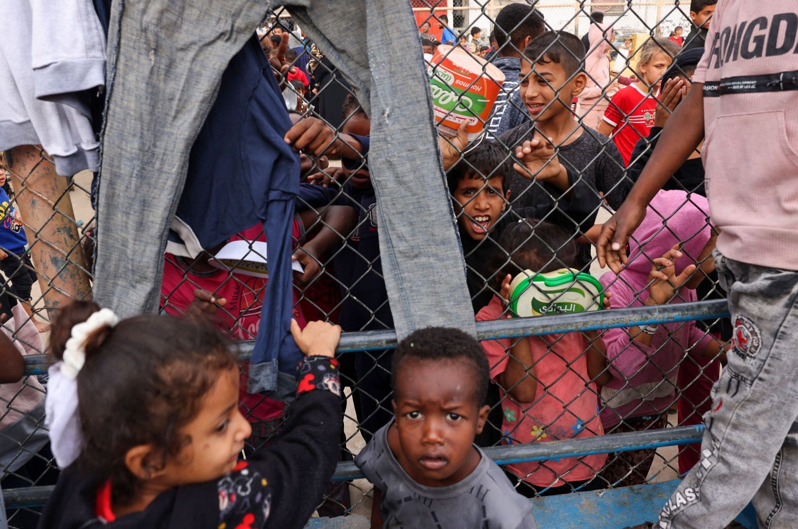 Displaced Palestinian children gather for breakfast at a refugee camp in Rafah, southern Gaza Strip, Palestine, Nov. 12, 2023. (AFP Photo)