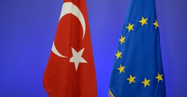 The Turkish national flag and the European Union flag stand side by side ahead of a summit on relations between Türkiye and the EU, Brussels, Belgium, Nov. 29, 2015. (AFP Photo)
