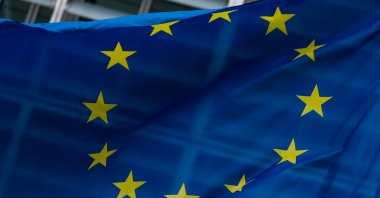 A European flag flies in front of the Berlaymont building hosting the European Commission ahead of an EU Agriculture and Fisheries Council meeting, in Brussels, Belgium, Dec. 11, 2022. (EPA Photo)