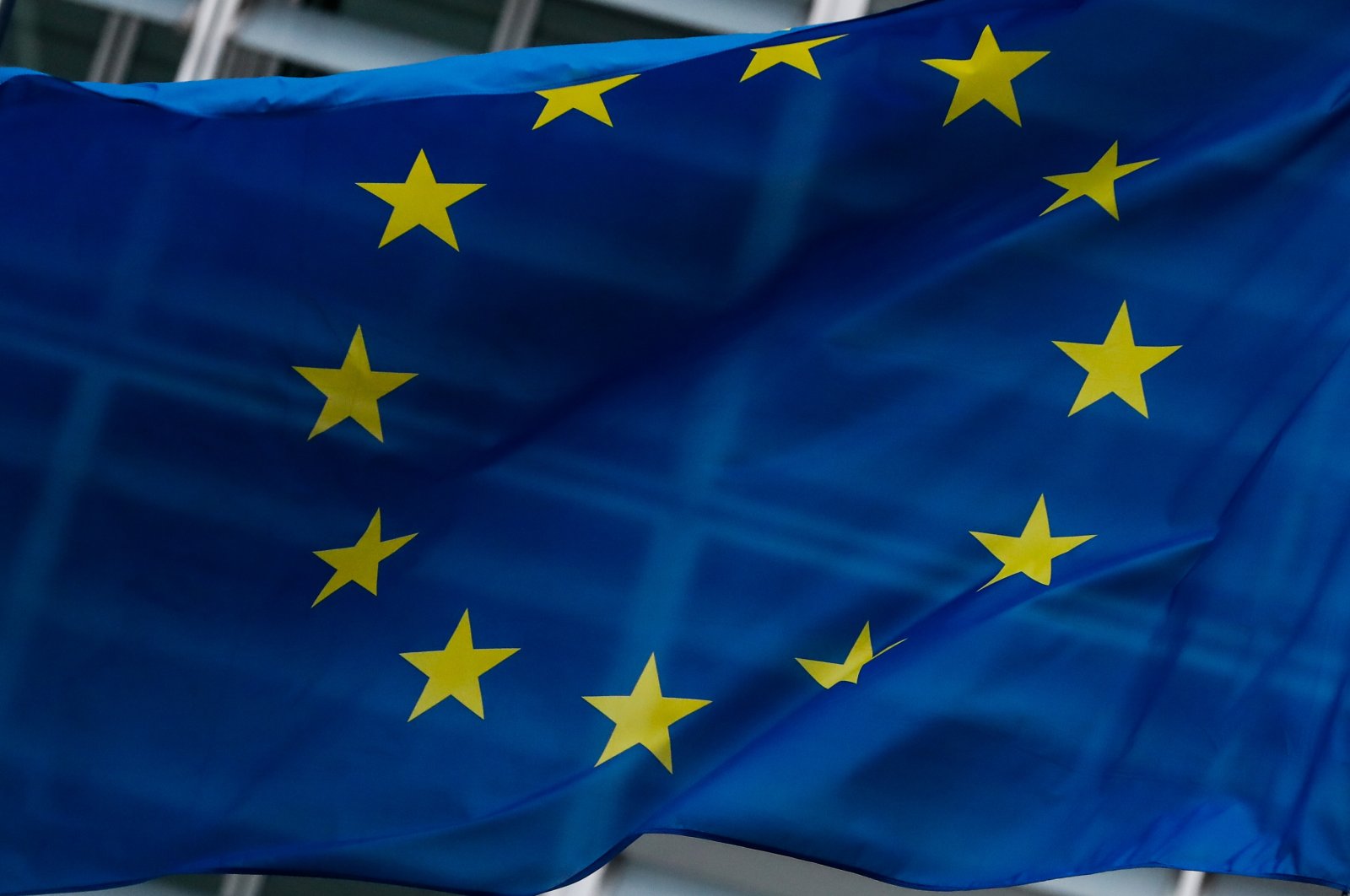 A European flag flies in front of the Berlaymont building hosting the European Commission ahead of an EU Agriculture and Fisheries Council meeting, in Brussels, Belgium, Dec. 11, 2022. (EPA Photo)