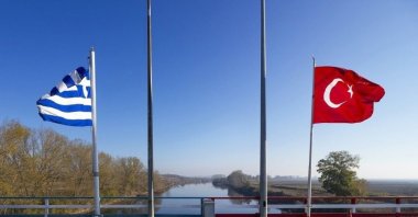 Turkish and Greek flags photographed near the Maritsa (Meriç) River in this undated file photo. (AA Photo)