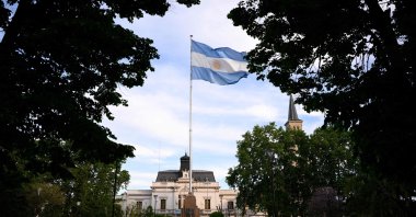 Argentina's national flag flutters in the wind at 25 de Mayo Square in the town of Saladillo, Buenos Aires Province, Argentina, Nov. 9, 2023. (AFP Photo)