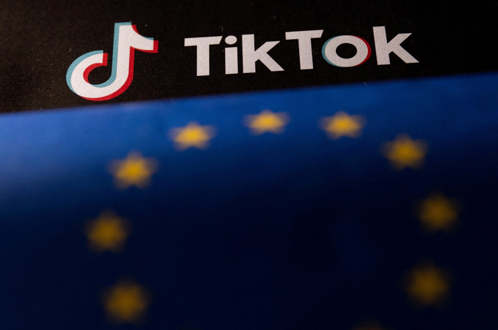 The EU flag and TikTok logo, June 2, 2023. (Reuters Photo)