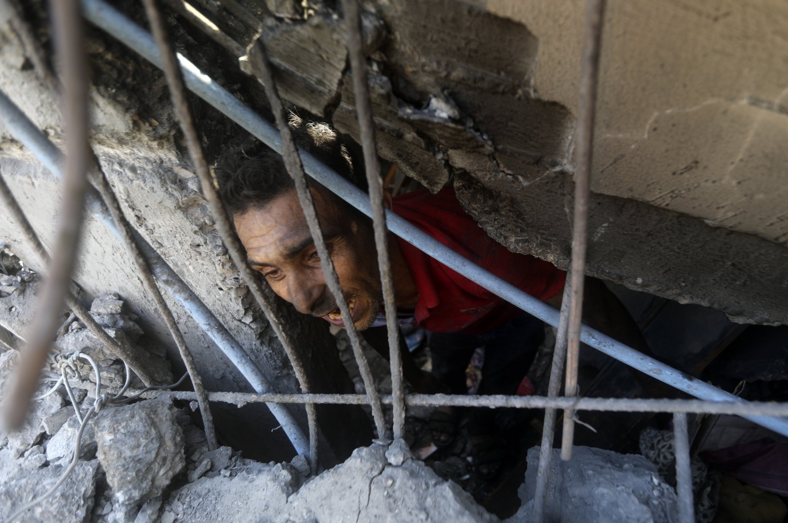 Palestinians inspect the rubble of destroyed buildings following Israeli airstrikes on the town of Khan Younis, Gaza Strip, Palestine, Nov. 6, 2023. (AP Photo)