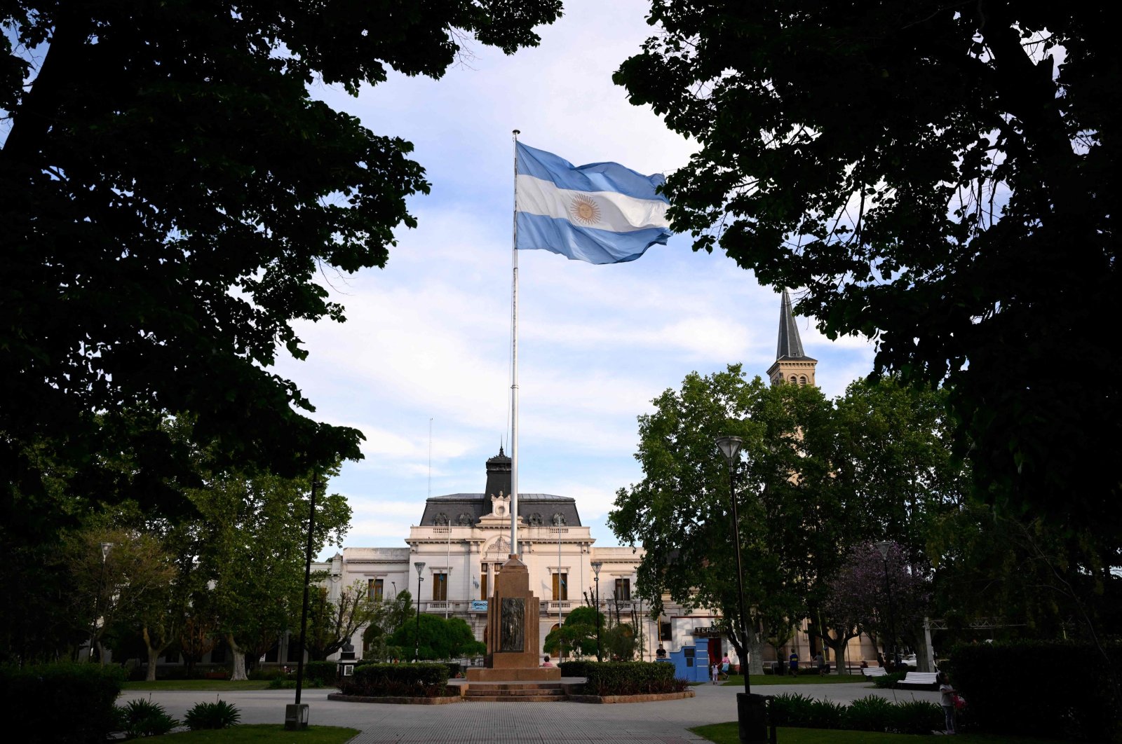 Argentina&#039;s national flag flutters in the wind at 25 de Mayo Square in the town of Saladillo, Buenos Aires Province, Argentina, Nov. 9, 2023. (AFP Photo)