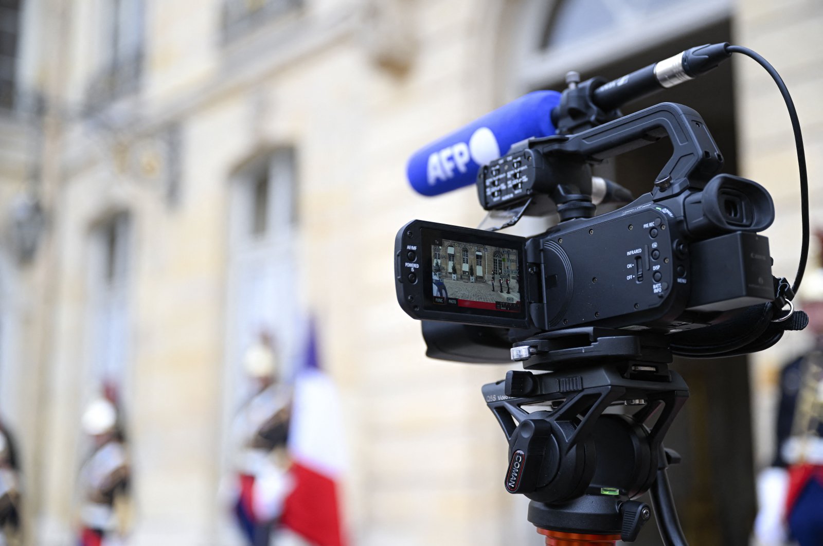 Illustration with a TV camera lens with the logo of Agence France-Presse (AFP) at the Hotel Matignon, Paris, France, June 28, 2023. (Reuters File Photo)