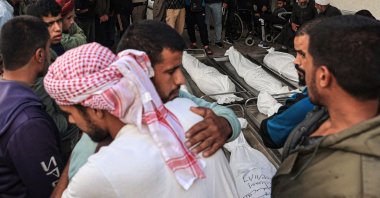 Palestinians mourn over bodies following overnight Israeli bombardment in Rafah in the southern Gaza Strip, Palestine, on Nov.17, 2023. (AFP Photo)