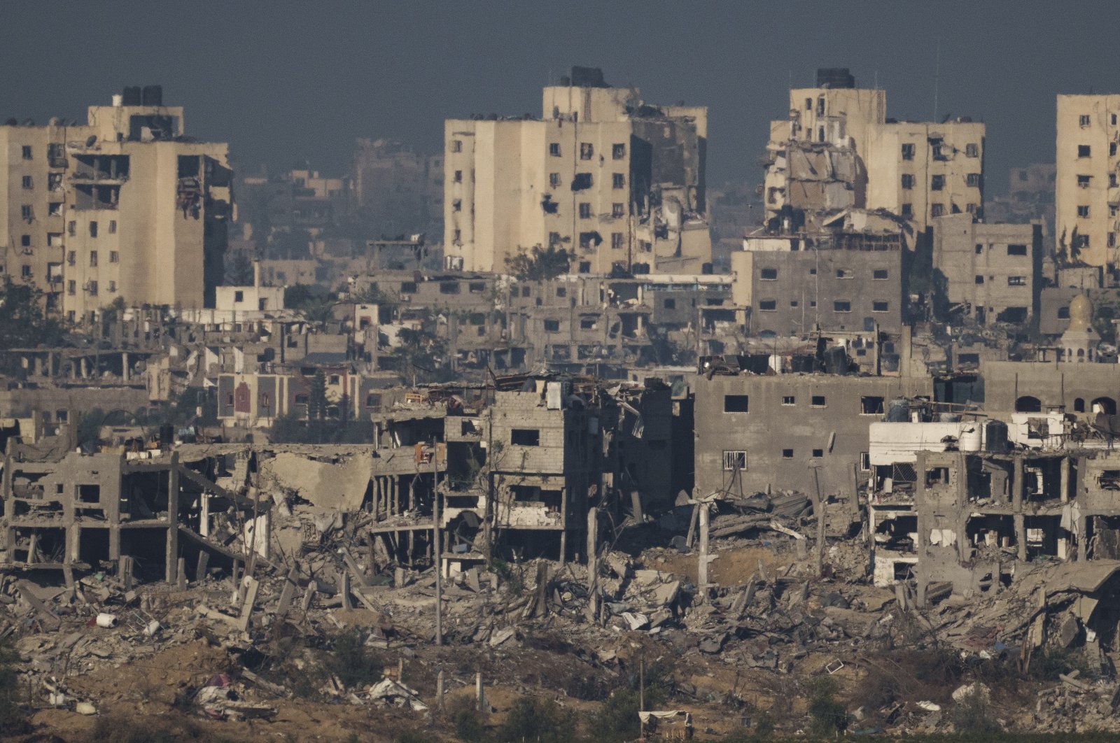 Remains of buildings destroyed by Israeli strikes are seen in the Gaza Strip, Palestine, Nov. 16, 2023. (AP Photo)