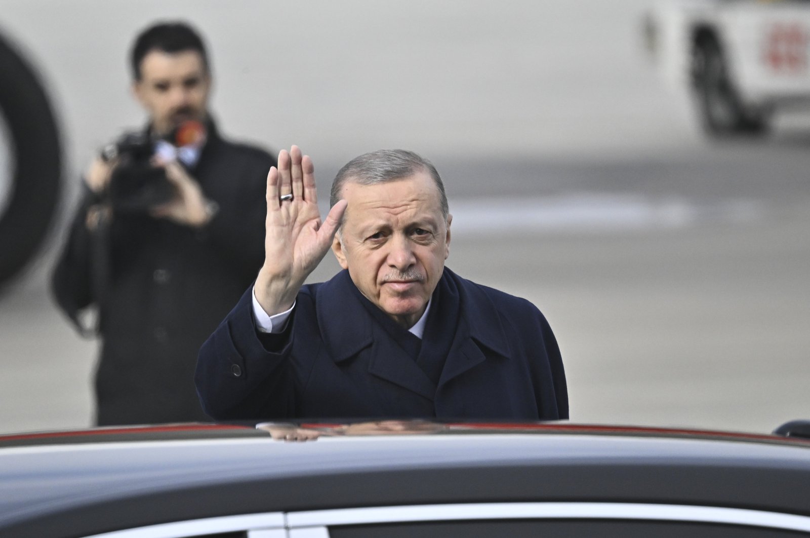 President Recep Tayyip Erdoğan waves as he departs for Germany, in the capital Ankara, Türkiye, Nov. 17, 2023. (AA Photo)