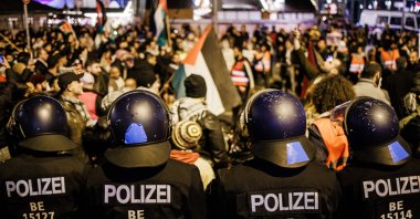 Police officers with helmets stand guard during a protest in solidarity with Palestinians, in Berlin, Germany, Nov. 4, 2023. (EPA File Photo)