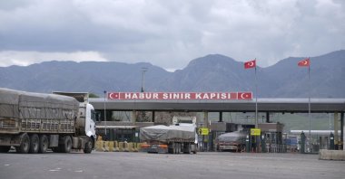 Trucks are seen passing through the Habur border gate to Iraq in Şırnak province, southeastern Türkiye, April 5, 2020. (Sabah Photo)