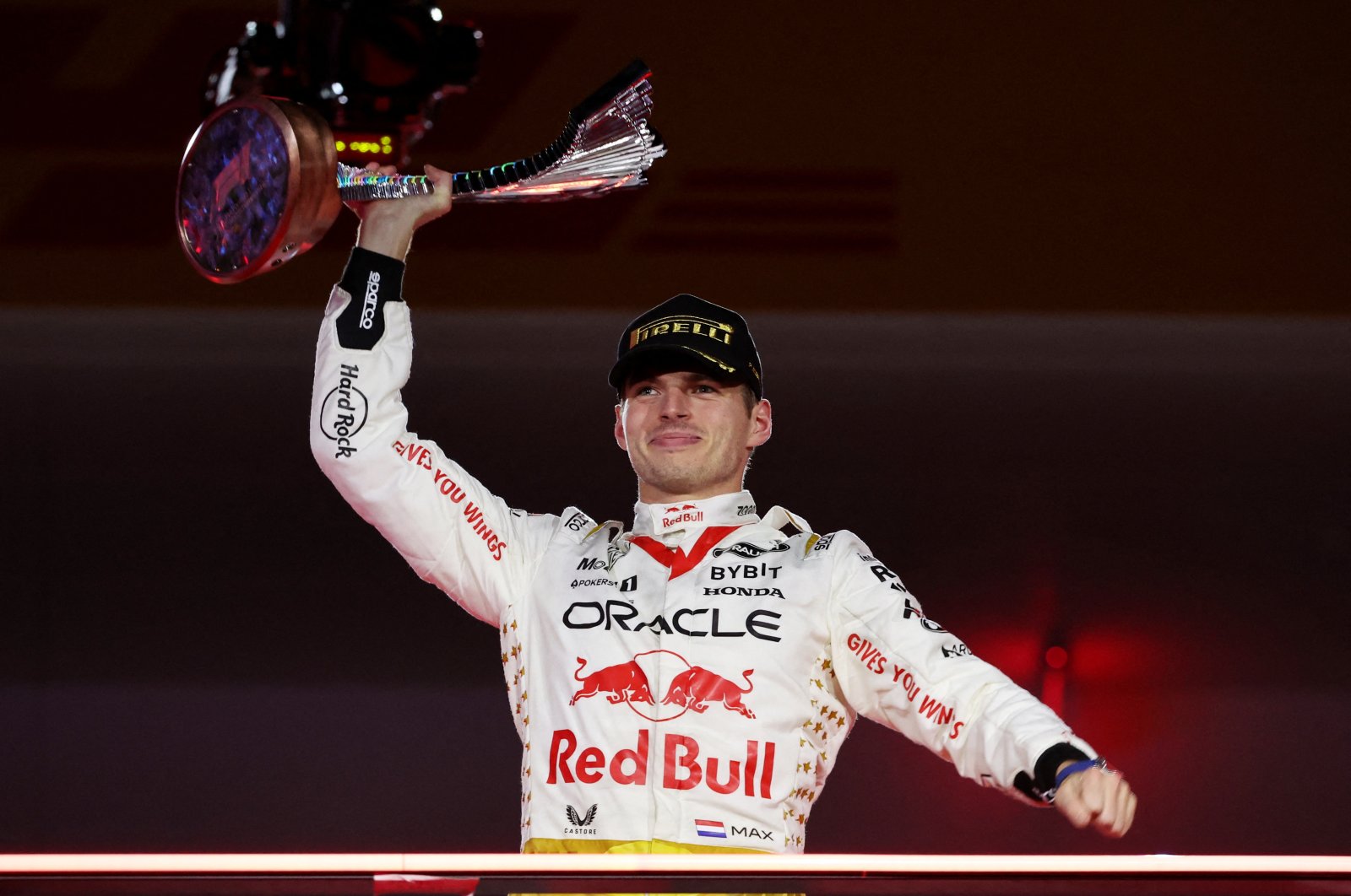 First-placed Red Bull&#039;s Max Verstappen celebrates with the trophy on the Las Vegas Grand Prix podium at the Las Vegas Strip Circuit, Las Vegas, Nevada, U.S., Nov. 18, 2023. (Reuters Photo)