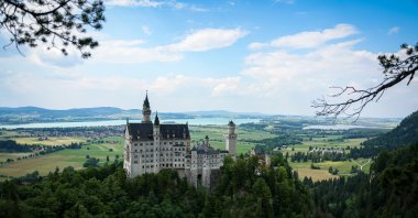Neuschwanstein Castle can be reached using horse-drawn carriages or enjoy the view by walking. (Getty Images Photo)