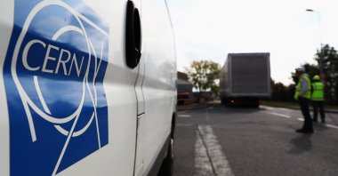 A bus with the logo of the European Organization for Nuclear Research (CERN) is seen at the CERN complex in Geneva, Switzerland, Oct. 12, 2016. (Getty Images Photo)