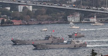 This aerial picture taken shows Turkish Naval Forces warships sailing during a military naval parade on the Bosporus to mark the 100th-anniversary celebrations of the Turkish republic, Istanbul, Türkiye, Oct. 29, 2023. (AFP Photo)