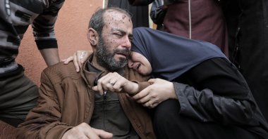 People mourn as they collect the bodies of Palestinians killed in airstrikes in Khan Yunis, Gaza, Palestine, Nov. 19, 2023. (Getty Images Photo)