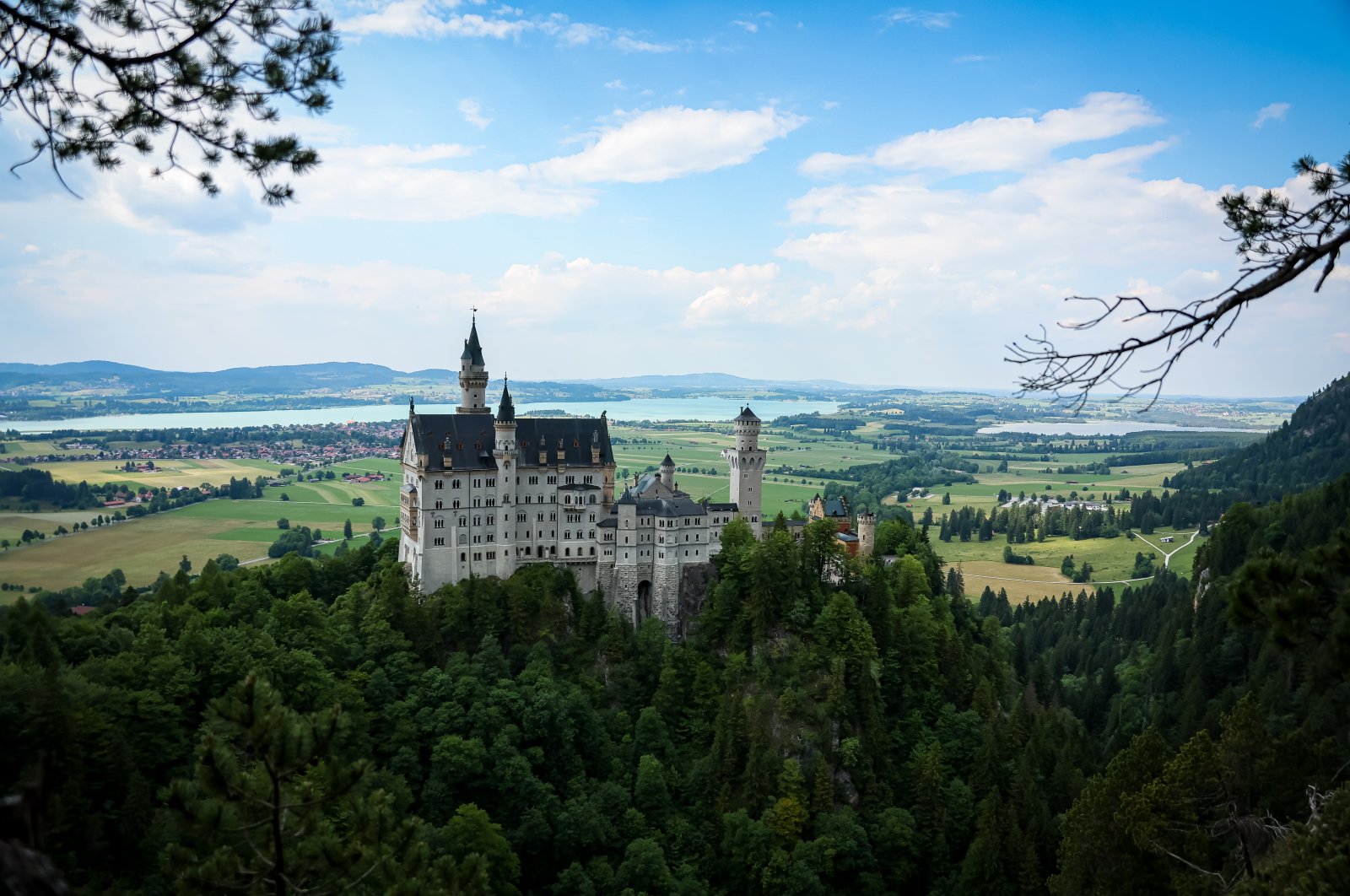 Neuschwanstein Castle can be reached using horse-drawn carriages or enjoy the view by walking. (Getty Images Photo)