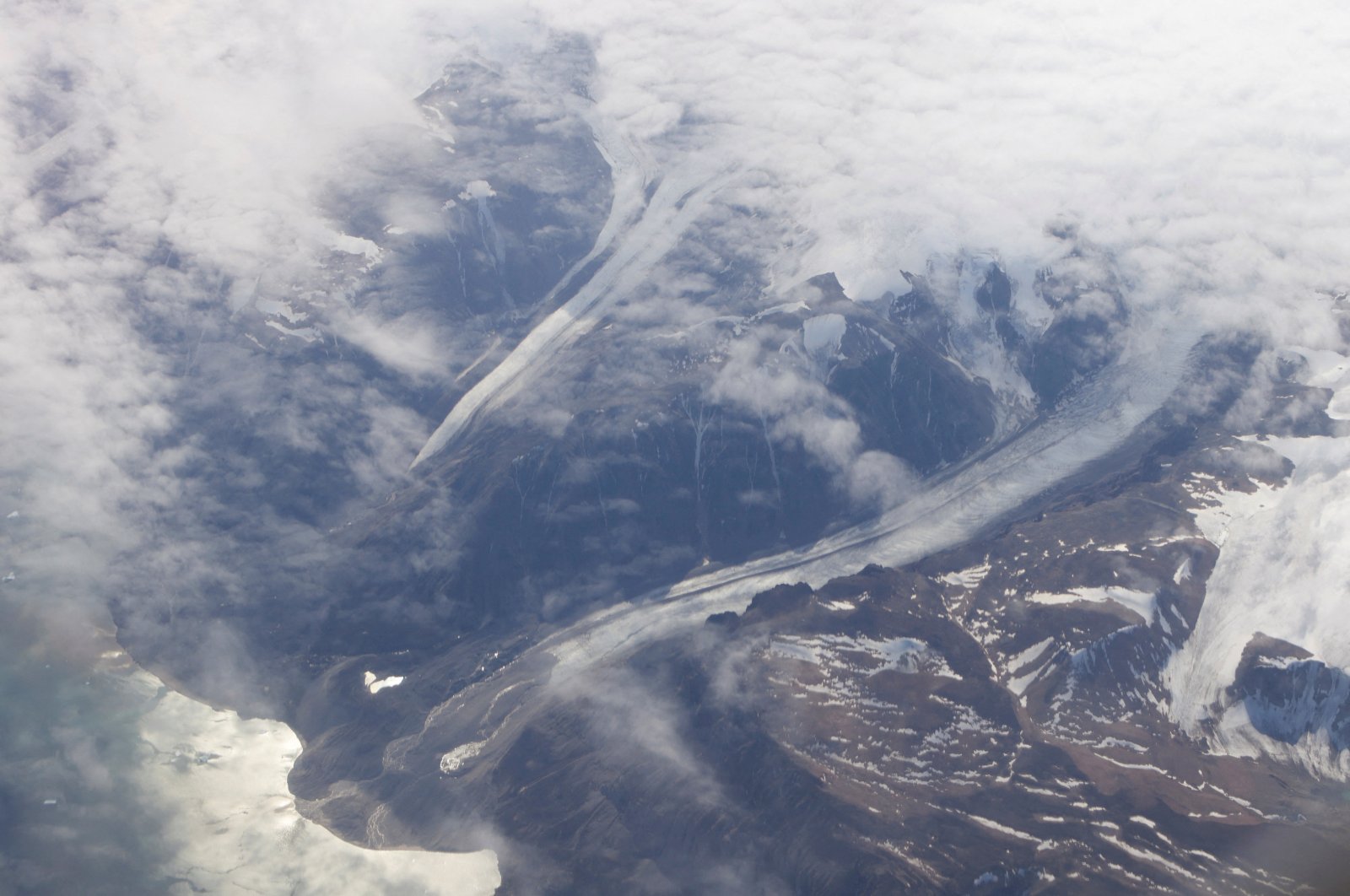 Valleys cut by glaciers of the Greenland Ice Sheet along the mountains of Greenland, Aug. 3, 2022. (Reuters Photo)