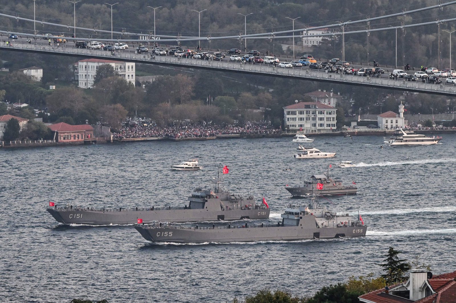 This aerial picture taken shows Turkish Naval Forces warships sailing during a military naval parade on the Bosporus to mark the 100th-anniversary celebrations of the Turkish republic, Istanbul, Türkiye, Oct. 29, 2023. (AFP Photo)
