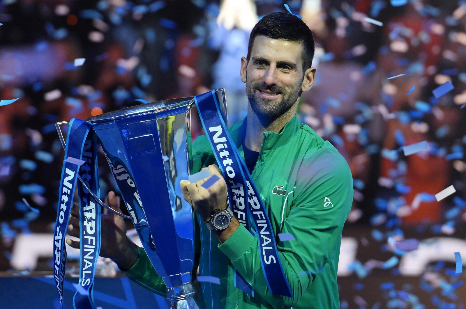 Novak Djokovic of Serbia poses with the trophy after winning his singles finals match against Jannik Sinner of Italy at the Nitto ATP Finals tennis tournament in Turin, Italy, Nov. 19, 2023. (EPA Photo)