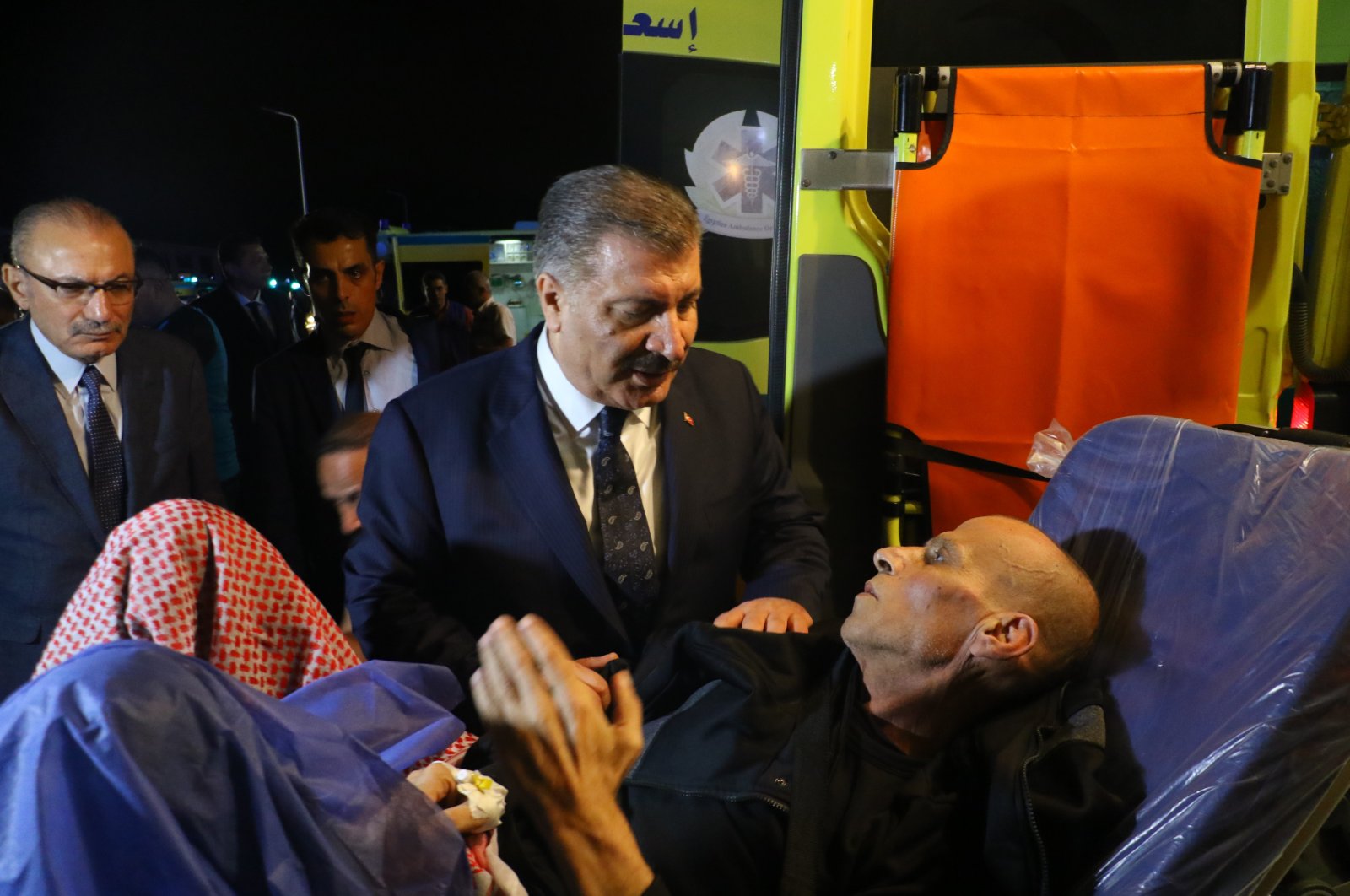 Health Minister Fahrettin Koca talks to a patient brought in from Gaza, in the capital Ankara, Türkiye, Nov. 16, 2023. (İHA Photo)