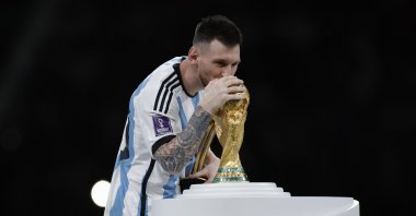Argentina&#039;s Lionel Messi kisses the FIFA World Cup trophy at the presentation ceremony during the FIFA World Cup 2022 Final between Argentina and France at Lusail Iconic Stadium, Doha, Qatar, Dec 18, 2022. (Getty Images Photo)