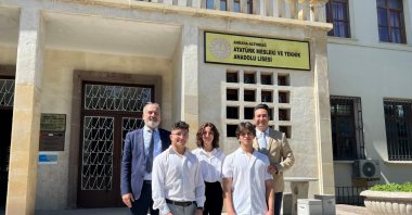 The students behind the &quot;Smart Recycling&quot; project stand along with their teachers in front of Altındağ Atatürk Vocational and Technical Anatolian High School, Ankara, Türkiye, Nov. 21, 2023. (Sabah Photo)