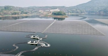 This aerial picture shows the newly built floating solar power plant that can generate 192 megawatts of peak electricity in cooperation between the Indonesian government and Masdar from the UAE, at Cirata Reservoir, West Java, Indonesia, Nov. 9, 2023. (AFP Photo)