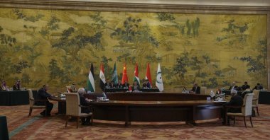 Chinese Foreign Minister Wang Yi (C) speaks during a round table meeting with five Arab and Islamic counterparts from center clock wise, Jordanian Deputy Prime Minister and Foreign Minister Ayman Safadi, Indonesian Foreign Minister Retno Marsudi, Secretary-General of the Organization of Islamic Cooperation (OIC) Hissein Brahim Taha, Palestine Foreign Minister Riyad al-Maliki, Egyptian Foreign Minister Sameh Shoukry and Saudi Arabia&#039;s Foreign Minister Faisal bin Farhan Al Saud at the Diaoyutai state guesthouse in Beijing, China, Nov. 20, 2023. (AP Photo)