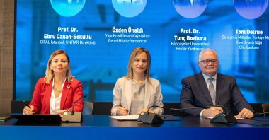 Ebru Canan-Sokullu, director of CIFAL Istanbul-UNITAR, Özden Önaldı, Yapı Kredi deputy general manager, and Tunç Bozbura, vice-rector of Bahçeşehir University, are seen during the conference presenting the project, titled "Equal Opportunity in Technology," Istanbul, Türkiye, Nov. 21, 2023. (Courtesy of Yapı Kredi Bank)