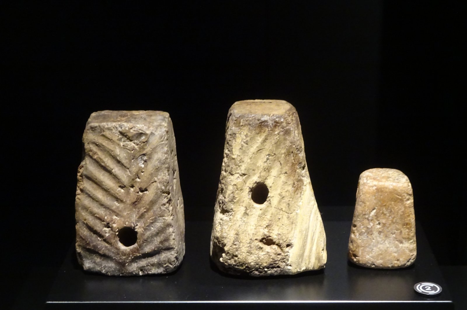 Terracotta weaving weights from the Early Bronze Age. (Photo by Peter Dore)